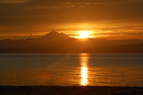 Sunrise over Mt. Baker, Washington looking from private cove on San Juan Island   August, 2011